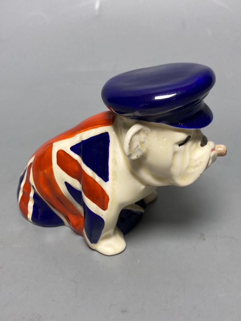 After Charles Noke, a Royal Douton Union Jack British Bulldog, height 7cm